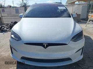 2023 Tesla Model X Plaid with VIN 7SAXCBE63PF405105, listed as a IAAI auction lot 41876918 with 22,475 mi miles and . Bid and sale history available at DreamBid. Image 13.
