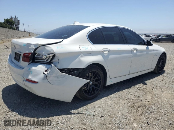 2016 BMW 5 Series 528i with VIN WBA5A5C5XGD526403, listed as a Copart auction lot 60992835 with 106,004 mi miles and Salvage title. Bid and sale history available at DreamBid. Image 3.