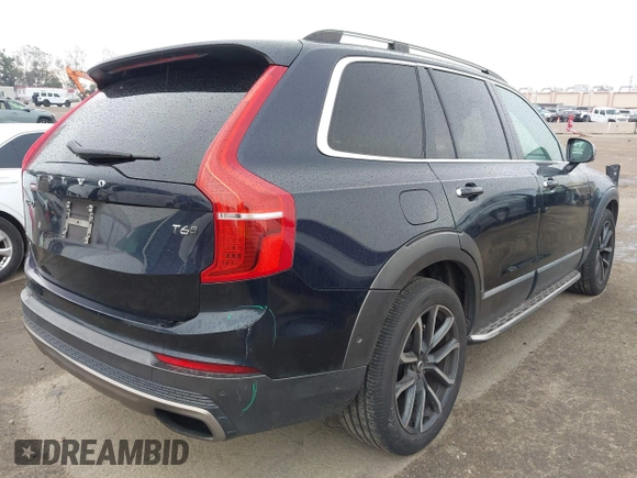 2016 Volvo XC90 T6 Momentum with VIN YV4A22PK8G1022234, listed as a IAAI auction lot 41705411 with 123,072 mi miles. Bid and sale history available at carsss.com. Image 4.