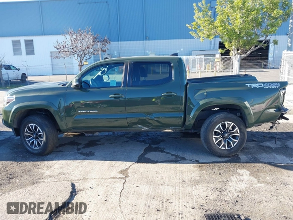 2021 Toyota Tacoma SR with VIN 3TMCZ5AN7MM395940, listed as a IAAI auction lot 41240832 with 39,338 mi miles and . Bid and sale history available at DreamBid. Image 14.