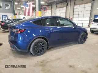 2023 Tesla Model Y Long Range with VIN 7SAYGDEE7PA180793, listed as a Copart auction lot 46706855 with 18,136 mi miles and Non Repairable. Bid and sale history available at DreamBid. Image 3.