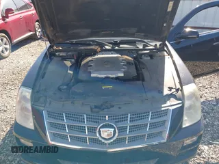 2008 Cadillac STS RWD z VIN 1G6DW67V780113057, wystawiony jako IAAI lot #41997608 z przebiegiem 159 968 mil mil oraz . Historia ofert i sprzedaży dostępna na DreamBid. Obrazek 10.