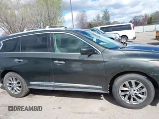 2013 Infiniti JX35 z VIN 5N1AL0MM0DC302090, wystawiony jako IAAI lot #41945285 z przebiegiem 198 767 mil mil oraz . Historia ofert i sprzedaży dostępna na DreamBid. Obrazek 13.