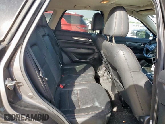 2019 Mazda CX-5 Grand Touring with VIN JM3KFADM8K1634011, listed as a Copart auction lot 57343455 with 67,138 mi miles and Salvage title. Bid and sale history available at DreamBid. Image 11.