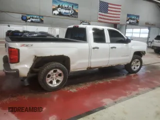 2014 Chevrolet Silverado 1500 LT with VIN 1GCVKREC8EZ413682, listed as a Copart auction lot 50869935 with 140,224 mi miles and Salvage Title. Bid and sale history available at DreamBid. Image 3.