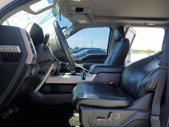 2015 Ford F-150 XLT w/HD Payload Pkg with VIN 1FTFW1EFXFFA96804, listed as a Copart auction lot 52321785 with 76,325 mi miles and Salvage Title. Bid and sale history available at carsss.com. Image 7.