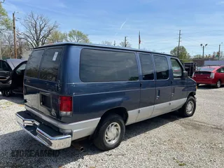 1998 Ford Econoline Passenger XL with VIN 1FMRE11L6WHB65841, listed as a IAAI auction lot 42123953 with 63,138 mi miles. Bid and sale history available at carsss.com. Image 4.