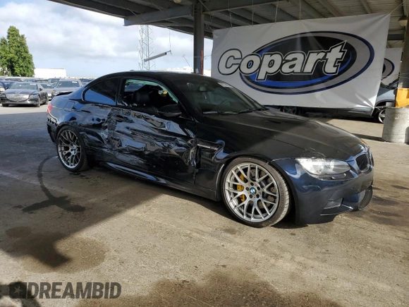 2012 BMW M3 with VIN WBSKG9C57CE798240, listed as a Copart auction lot 61774515 with 83,322 mi miles and Salvage title. Bid and sale history available at DreamBid. Image 4.