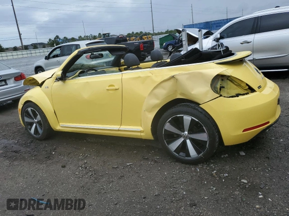 2013 Volkswagen Beetle 2.5L with VIN 3VW5P7AT6DM812504, listed as a Copart auction lot 52156165 with 53,682 mi miles and Salvage Title. Bid and sale history available at DreamBid. Image 2.