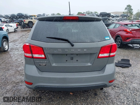 2019 Dodge Journey SE with VIN 3C4PDCBB2KT804440, listed as a IAAI auction lot 41333876 with 72,209 mi miles and . Bid and sale history available at DreamBid. Image 16.