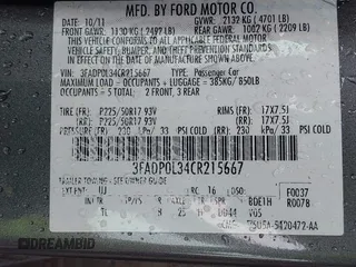 2012 Ford Fusion Hybrid with VIN 3FADP0L34CR215667, listed as a IAAI auction lot 41957936 with 158,914 mi miles and . Bid and sale history available at DreamBid. Image 9.