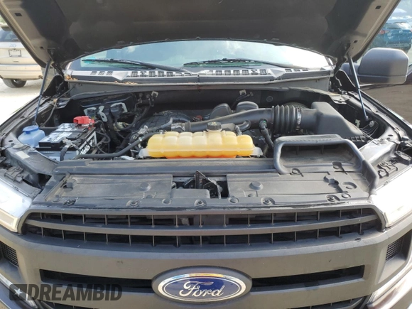 2018 Ford F-150 XL with VIN 1FTEX1CB0JFB12963, listed as a Copart auction lot 51076365 with 107,086 mi miles and Salvage Title. Bid and sale history available at carsss.com. Image 11.