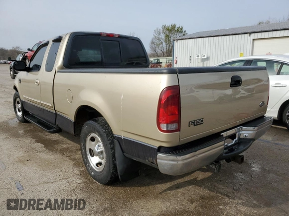 2000 Ford F-150 XL with VIN 2FTRX17W0YCA73568, listed as a Copart auction lot 51128035 with 208,737 mi miles and Salvage Title. Bid and sale history available at carsss.com. Image 2.