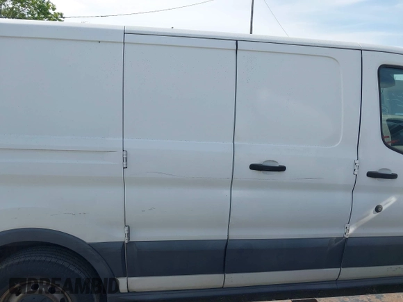 2016 Ford Transit Cargo with VIN 1FTYE1ZM0GKB06687, listed as a IAAI auction lot 42232871 with 330,423 mi miles and . Bid and sale history available at DreamBid. Image 13.