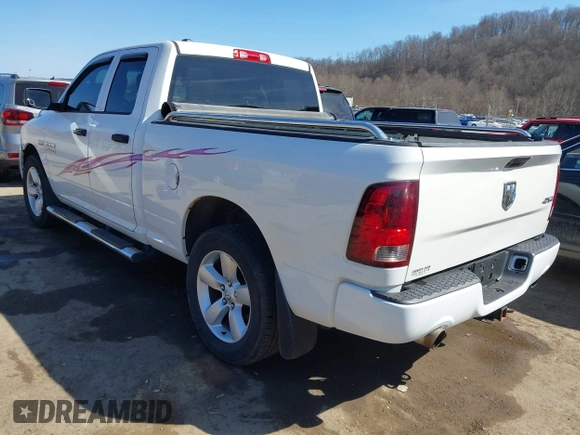 2014 Ram 1500 Express z VIN 1C6RR7FT3ES192539, wystawiony jako IAAI lot #41760162 z przebiegiem 107 098 mil mil oraz . Historia ofert i sprzedaży dostępna na DreamBid. Obrazek 3.
