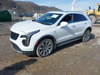 2020 Cadillac XT4 AWD Premium Luxury z VIN 1GYFZDR45LF016381, wystawiony jako IAAI lot #41556874 z przebiegiem 23 887 mil mil oraz . Historia ofert i sprzedaży dostępna na DreamBid. Obrazek 2.