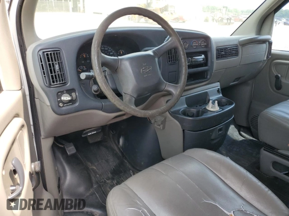 1999 Chevrolet Express Cargo with VIN 1GCHG35R3X1110004, listed as a Copart auction lot 59386095 with 141,925 mi miles and Salvage title. Bid and sale history available at DreamBid. Image 8.