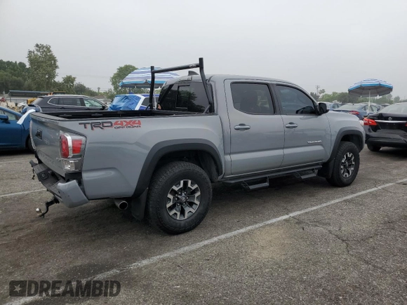 2021 Toyota Tacoma SR with VIN 3TMCZ5AN4MM402889, listed as a Copart auction lot 59942695 with 61,504 mi miles and Salvage title. Bid and sale history available at DreamBid. Image 3.
