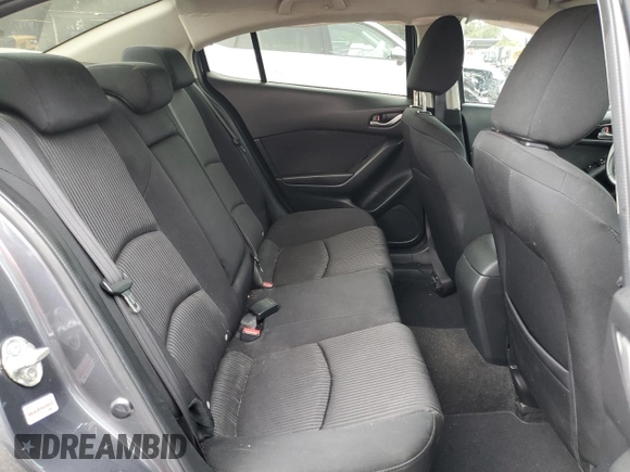 2016 Mazda 3 i Touring z VIN JM1BM1V7XG1311352, wystawiony jako Copart lot #56194805 z przebiegiem 115 321 mil mil oraz Szkoda całkowita • Salvage title. Historia ofert i sprzedaży dostępna na DreamBid. Obrazek 10.