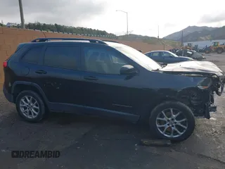 2016 Jeep Cherokee Sport with VIN 1C4PJLASXGW347372, listed as a IAAI auction lot 41788589 with 168,247 mi miles and . Bid and sale history available at DreamBid. Image 14.