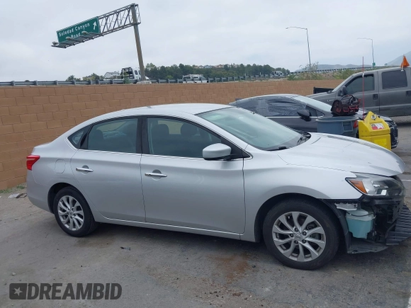 2019 Nissan Sentra SV with VIN 3N1AB7AP7KL618363, listed as a IAAI auction lot 42094721 with 80,460 mi miles and . Bid and sale history available at DreamBid. Image 13.