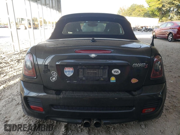 2015 MINI Roadster S z VIN WMWSY3C59FT566785, wystawiony jako Copart lot #73574064 z przebiegiem 96 623 mil mil oraz Tytuł czysty. Historia ofert i sprzedaży dostępna na DreamBid. Obrazek 6.