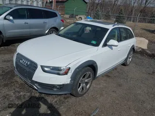 2013 Audi allroad Premium Plus with VIN WA1UFAFLXDA235846, listed as a IAAI auction lot 41643474 with 111,662 mi miles. Bid and sale history available at carsss.com. Image 2.