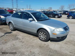 2003 Volkswagen Passat GLS with VIN WVWPD63B43P396108, listed as a IAAI auction lot 41884512 with 87,004 mi miles. Bid and sale history available at carsss.com. Image 1.