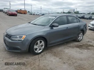 2014 Volkswagen Jetta TDI w/Premium/Nav с VIN 3VWLL7AJ1EM430822, выставлен на аукционе Copart как лот 57405845 с пробегом 112 178 миль миль и Списание • Salvage title. История ставок и продаж доступна на DreamBid. Изображение 1.