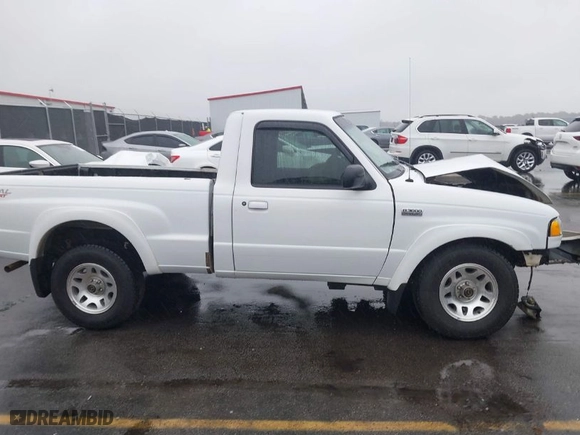 2002 Mazda B-Series 2WD Truck DS with VIN 4F4YR12U82TM11900, listed as a IAAI auction lot 40773356 with 118,353 mi miles. Bid and sale history available at carsss.com. Image 13.