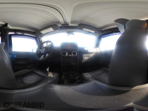 2010 Jeep Wrangler Sahara z VIN 1J4AA5D18AL170957, wystawiony jako IAAI lot #41599820 z przebiegiem 64 217 mil mil oraz . Historia ofert i sprzedaży dostępna na DreamBid. Obrazek 18.