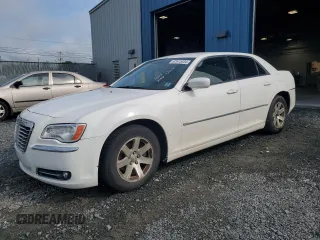 2013 Chrysler 300 Motown with VIN 2C3CCAAG7DH522216, listed as a Copart auction lot 62615334 with 313,157 mi miles and Salvage Title. Bid and sale history available at carsss.com. Image 1.
