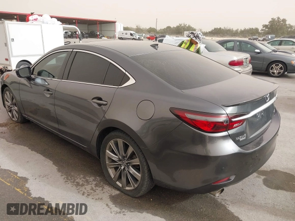 2020 Mazda 6 Signature with VIN JM1GL1XY6L1522900, listed as a IAAI auction lot 41724818 with 62,846 mi miles and . Bid and sale history available at DreamBid. Image 3.