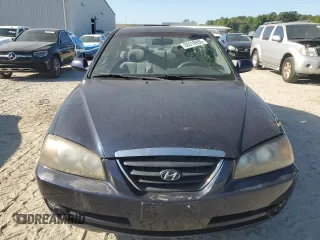 2005 Hyundai Elantra GLS z VIN KMHDN46DX5U986718, wystawiony jako Copart lot #55510955 z przebiegiem 133 101 mil mil oraz Tytuł czysty. Historia ofert i sprzedaży dostępna na DreamBid. Obrazek 5.