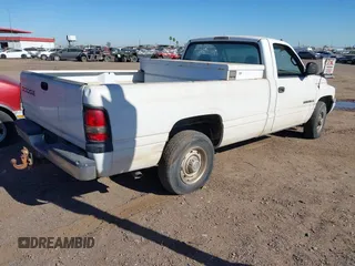 1999 Dodge Ram 2500 with VIN 3B7KC26Z4XM501014, listed as a IAAI auction lot 41859177 with 164,277 mi miles. Bid and sale history available at carsss.com. Image 4.