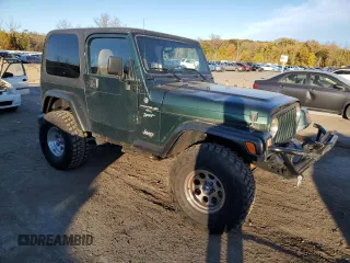 1999 Jeep Wrangler Sport with VIN 1J4FY19S5XP482053, listed as a Copart auction lot 75925774 with 112,503 mi miles and Salvage Title. Bid and sale history available at carsss.com. Image 4.
