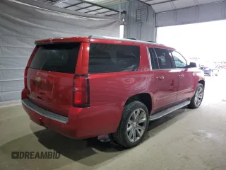2015 Chevrolet Suburban LTZ with VIN 1GNSKKKC7FR299567, listed as a Copart auction lot 52944035 with 147,964 mi miles and Salvage Title. Bid and sale history available at DreamBid. Image 3.