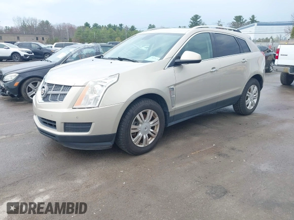 2011 Cadillac SRX Luxury Collection with VIN 3GYFNAEY4BS663447, listed as a IAAI auction lot 42134933 with 153,411 mi miles and . Bid and sale history available at DreamBid. Image 2.