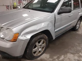 2009 Jeep Grand Cherokee Laredo with VIN 1J8GR48K89C553694, listed as a IAAI auction lot 41984820 with 196,266 mi miles. Bid and sale history available at carsss.com. Image 6.