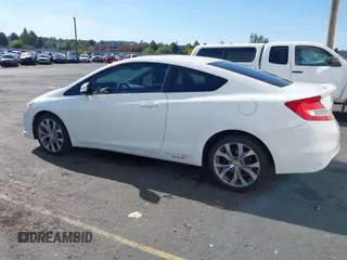 2012 Honda Civic Si with VIN 2HGFG4A57CH700350, listed as a IAAI auction lot 40497785 with 216,824 mi miles and . Bid and sale history available at DreamBid. Image 14.