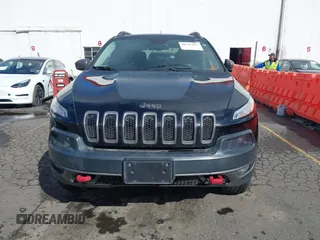 2015 Jeep Cherokee Trailhawk with VIN 1C4PJMBS7FW699392, listed as a IAAI auction lot 41797617 with 1 mi miles. Bid and sale history available at carsss.com. Image 12.