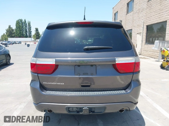 2013 Dodge Durango SXT with VIN 1C4RDHAG3DC694256, listed as a IAAI auction lot 42431904 with 152,321 mi miles and . Bid and sale history available at DreamBid. Image 16.