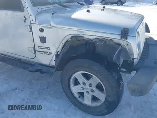 2012 Jeep Wrangler Unlimited Sport z VIN 1C4HJWDG3CL224800, wystawiony jako IAAI lot #41569279 z przebiegiem 174 336 mil mil oraz . Historia ofert i sprzedaży dostępna na DreamBid. Obrazek 6.