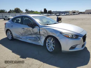 2017 Mazda 3 Grand Touring z VIN 3MZBN1W37HM141705, wystawiony jako Copart lot #56604255 z przebiegiem 62 308 mil mil oraz Szkoda całkowita • Salvage title. Historia ofert i sprzedaży dostępna na DreamBid. Obrazek 4.