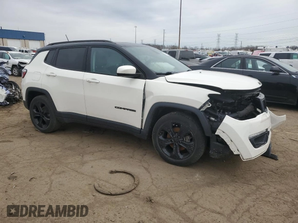 2019 Jeep Compass Altitude with VIN 3C4NJCBB4KT618673, listed as a Copart auction lot 51801955 with 104,784 mi miles and Salvage title. Bid and sale history available at DreamBid. Image 4.
