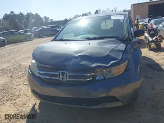 2012 Honda Odyssey EX-L with VIN 5FNRL5H64CB066240, listed as a IAAI auction lot 41792321 with 186,895 mi miles. Bid and sale history available at carsss.com. Image 11.