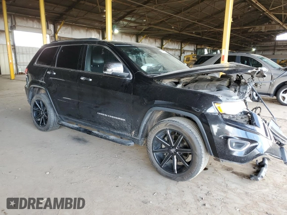 2015 Jeep Grand Cherokee Limited with VIN 1C4RJEBG7FC217855, listed as a Copart auction lot 50642135 with 124,130 mi miles and Salvage Title. Bid and sale history available at carsss.com. Image 4.