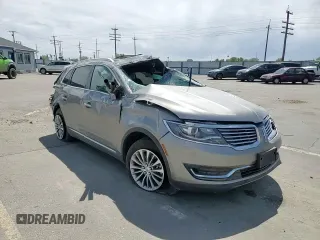 2016 Lincoln MKX Select z VIN 2LMTJ8KR9GBL38493, wystawiony jako Copart lot #54258865 z przebiegiem Nie podano mil oraz Szkoda całkowita • Salvage title. Historia ofert i sprzedaży dostępna na DreamBid. Obrazek 14.