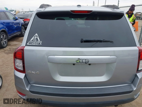 2016 Jeep Compass Sport with VIN 1C4NJDBB8GD780146, listed as a IAAI auction lot 41792416 with 127,548 mi miles. Bid and sale history available at carsss.com. Image 16.