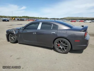 2013 Dodge Charger SXT Plus with VIN 2C3CDXHG0DH610871, listed as a Copart auction lot 52609855 with 135,974 mi miles and Salvage Title. Bid and sale history available at carsss.com. Image 2.